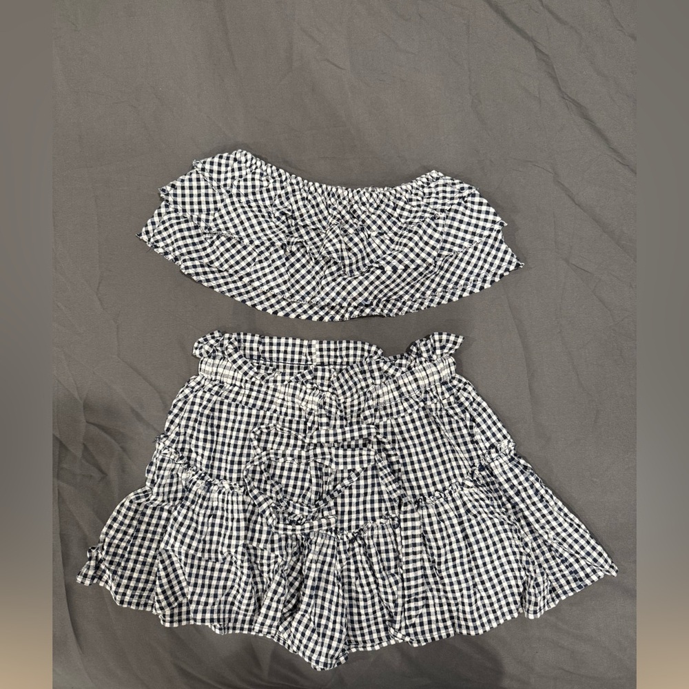 Revolve, Blue Life. Blue and white Skort and top in size Small.
